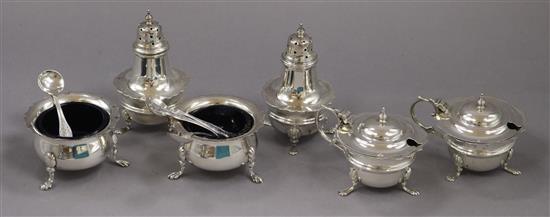 Six assorted silver condiments and a set of four silver salt spoons.